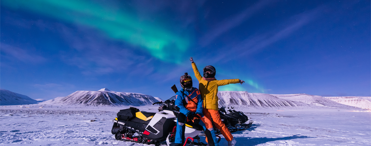 snowmobiling northern lights