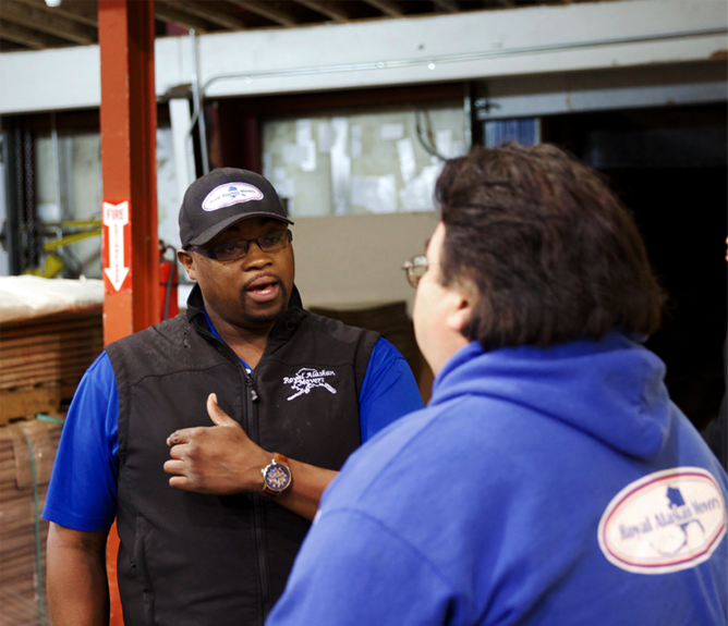 manager-talking-warehouse-is-left manager talking to employee