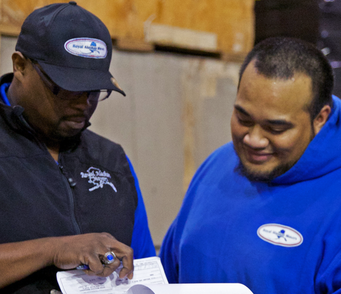 manager-talking-worker-warehouse-is-left employees discussing shipment