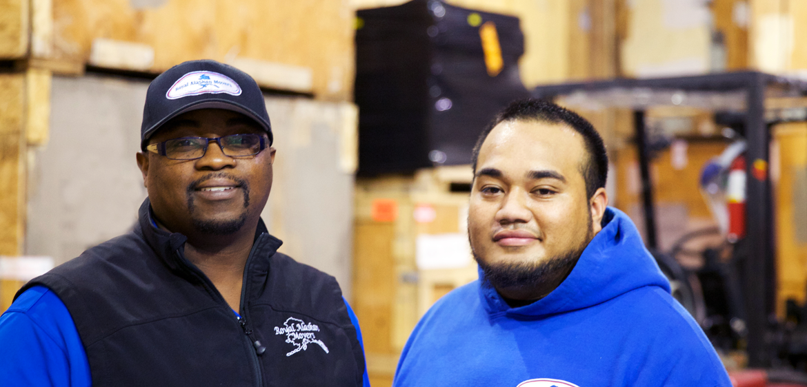 employees smiling in warehouse