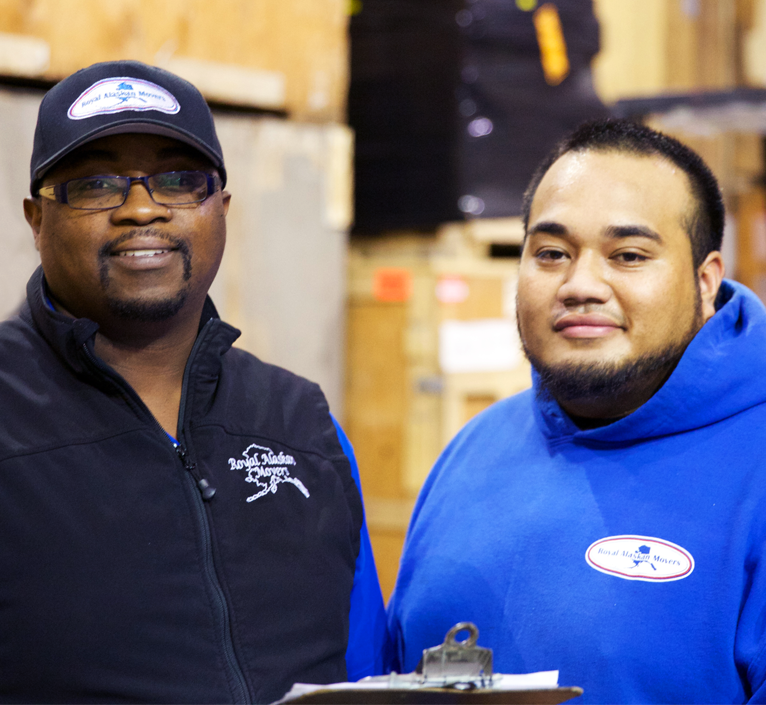 employees smiling with clipboard
