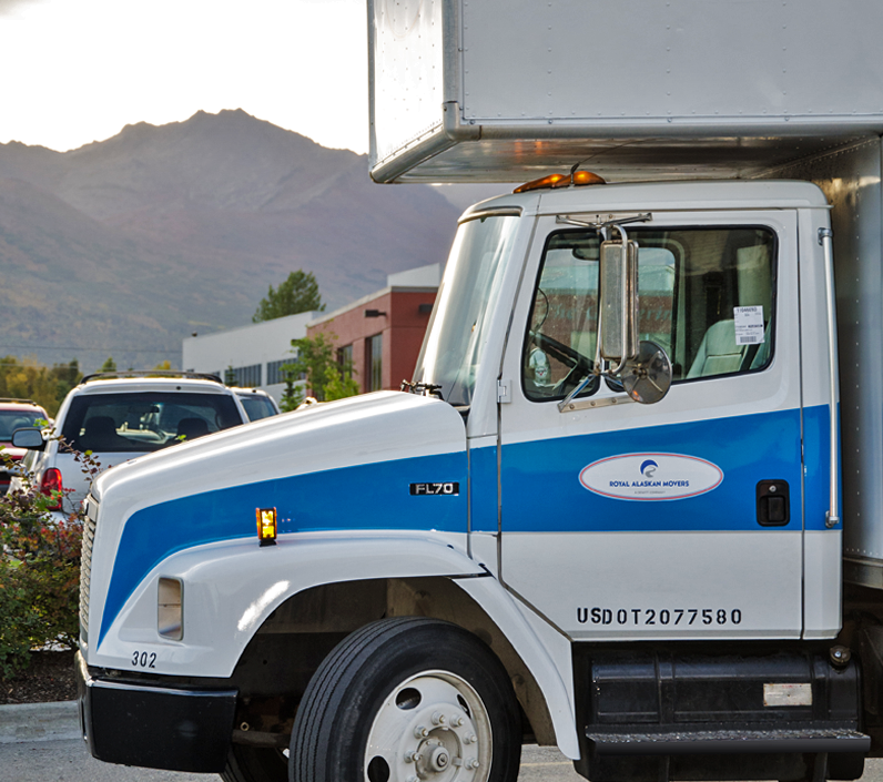 truck-parking-lot-mountain-cs-right moving truck with mountains