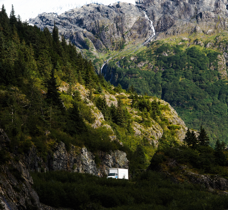 truck-road-mountain-distance-is-right royal alaskan movers truck mountain road