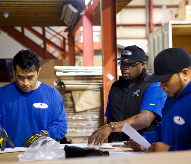 employees planning in warehouse