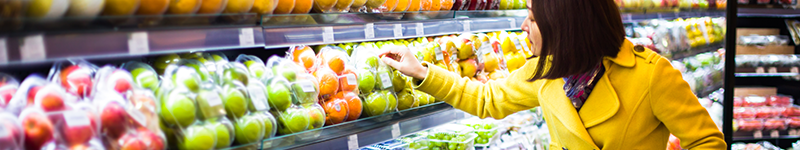 Young woman shopping in the supermarket