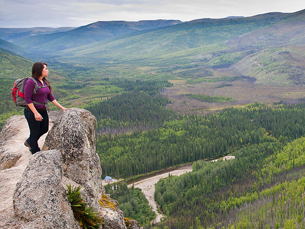 Woman overlooking a trail at the Chena River State Recreation Area