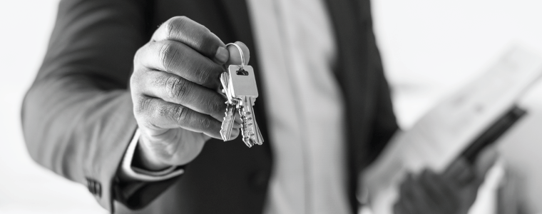 real estate agent holding house keys