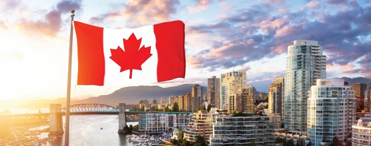 Canadian National Flag Overlay. False Creek, Downtown Vancouver, British Columbia, Canada. Beautiful Aerial View of a Modern City on the West Pacific Coast during a colorful Sunset.